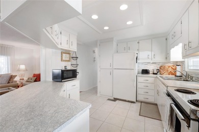 Charming 1980 Manufactured Home on the award winning Maple Leaf on Maple Leaf Golf and Country Club in Florida - for sale on GolfHomes.com, golf home, golf lot