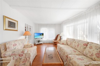 Charming 1980 Manufactured Home on the award winning Maple Leaf on Maple Leaf Golf and Country Club in Florida - for sale on GolfHomes.com, golf home, golf lot