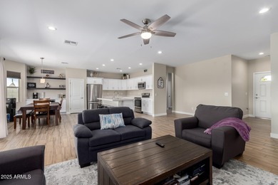 Feel right at home in this beautifully maintained 3-bedroom on Arizona City Golf Club in Arizona - for sale on GolfHomes.com, golf home, golf lot