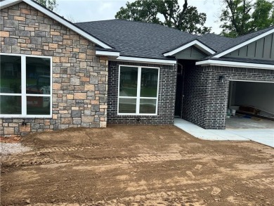 NEW CONSTRUCTION. Enjoy your beautiful, comfortable new home in on The Creeks Golf Course LLC in Arkansas - for sale on GolfHomes.com, golf home, golf lot
