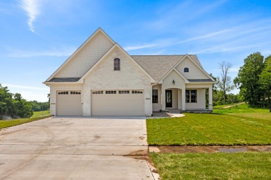 someone's new dream home. Don't let 'cottage' fool you, this on Tournament Club of Iowa in Iowa - for sale on GolfHomes.com, golf home, golf lot