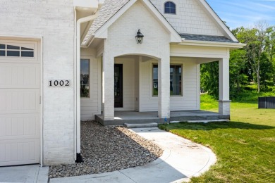 someone's new dream home. Don't let 'cottage' fool you, this on Tournament Club of Iowa in Iowa - for sale on GolfHomes.com, golf home, golf lot