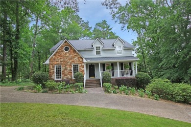 Welcome to this Cottage style home nestled against the 9th green on Saugahatchee Country Club in Alabama - for sale on GolfHomes.com, golf home, golf lot