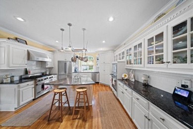 Exquisite estate home nestled on a private, wooded lot in the on Shadow Glen Golf Club in Kansas - for sale on GolfHomes.com, golf home, golf lot