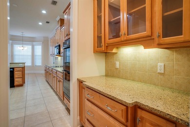 This stunning custom home in Southwood on Grove Park Dr on Southwood Golf Club in Florida - for sale on GolfHomes.com, golf home, golf lot