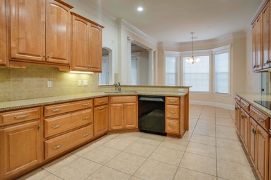 This stunning custom home in Southwood on Grove Park Dr on Southwood Golf Club in Florida - for sale on GolfHomes.com, golf home, golf lot