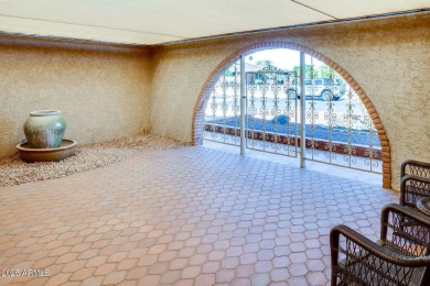 Escape to your dream home in this beautifully updated home on Sun City Lakes West and East in Arizona - for sale on GolfHomes.com, golf home, golf lot