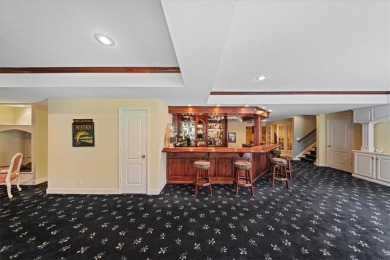 Exquisite estate home nestled on a private, wooded lot in the on Shadow Glen Golf Club in Kansas - for sale on GolfHomes.com, golf home, golf lot