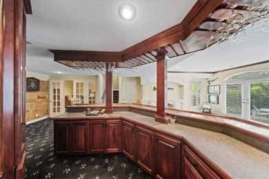 Exquisite estate home nestled on a private, wooded lot in the on Shadow Glen Golf Club in Kansas - for sale on GolfHomes.com, golf home, golf lot