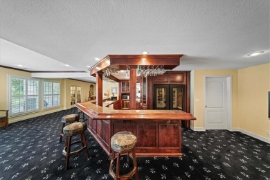 Exquisite estate home nestled on a private, wooded lot in the on Shadow Glen Golf Club in Kansas - for sale on GolfHomes.com, golf home, golf lot