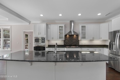 Meticulously maintained and thoughtfully designed for effortless on Lockwood Folly Country Club in North Carolina - for sale on GolfHomes.com, golf home, golf lot