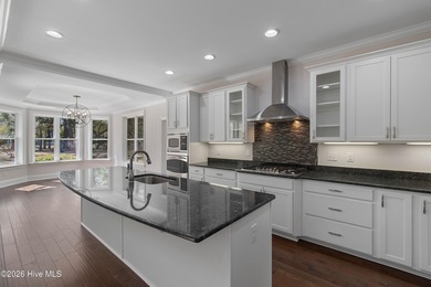 Meticulously maintained and thoughtfully designed for effortless on Lockwood Folly Country Club in North Carolina - for sale on GolfHomes.com, golf home, golf lot