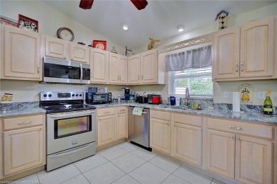 Staycation in your own backyard. Your own tropical paradise on Placid Lakes Country Club in Florida - for sale on GolfHomes.com, golf home, golf lot