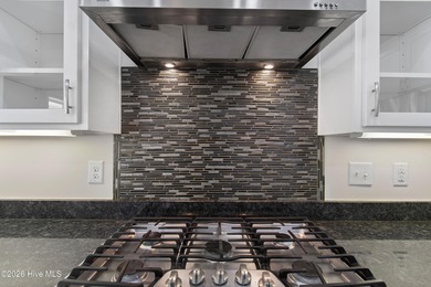 Meticulously maintained and thoughtfully designed for effortless on Lockwood Folly Country Club in North Carolina - for sale on GolfHomes.com, golf home, golf lot