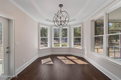 Meticulously maintained and thoughtfully designed for effortless on Lockwood Folly Country Club in North Carolina - for sale on GolfHomes.com, golf home, golf lot