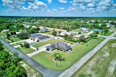 Staycation in your own backyard. Your own tropical paradise on Placid Lakes Country Club in Florida - for sale on GolfHomes.com, golf home, golf lot