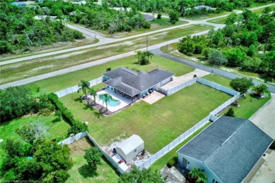 Staycation in your own backyard. Your own tropical paradise on Placid Lakes Country Club in Florida - for sale on GolfHomes.com, golf home, golf lot