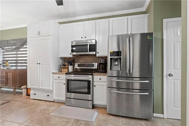 Look no further and bask at this exceptional residence nestled on Mirror Lake Golf Club in Georgia - for sale on GolfHomes.com, golf home, golf lot