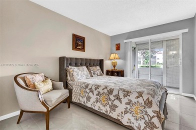 This inviting 2-bedroom, 1.5-bathroom condo on the 1st floor on Flamingo Lakes Country Club in Florida - for sale on GolfHomes.com, golf home, golf lot