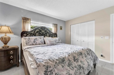 This inviting 2-bedroom, 1.5-bathroom condo on the 1st floor on Flamingo Lakes Country Club in Florida - for sale on GolfHomes.com, golf home, golf lot