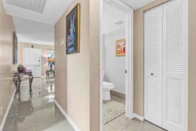 This inviting 2-bedroom, 1.5-bathroom condo on the 1st floor on Flamingo Lakes Country Club in Florida - for sale on GolfHomes.com, golf home, golf lot