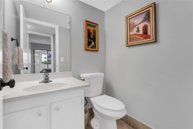 This inviting 2-bedroom, 1.5-bathroom condo on the 1st floor on Flamingo Lakes Country Club in Florida - for sale on GolfHomes.com, golf home, golf lot