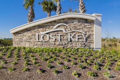 This beautifully furnished coastal residence is located in the on Lost Key Golf Club in Florida - for sale on GolfHomes.com, golf home, golf lot