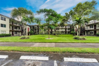 This inviting 2-bedroom, 1.5-bathroom condo on the 1st floor on Flamingo Lakes Country Club in Florida - for sale on GolfHomes.com, golf home, golf lot