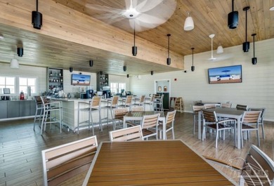 This beautifully furnished coastal residence is located in the on Lost Key Golf Club in Florida - for sale on GolfHomes.com, golf home, golf lot