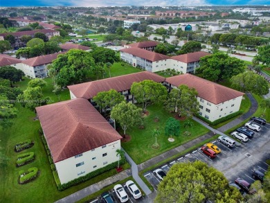 This inviting 2-bedroom, 1.5-bathroom condo on the 1st floor on Flamingo Lakes Country Club in Florida - for sale on GolfHomes.com, golf home, golf lot