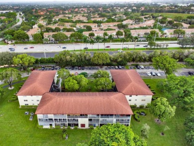 This inviting 2-bedroom, 1.5-bathroom condo on the 1st floor on Flamingo Lakes Country Club in Florida - for sale on GolfHomes.com, golf home, golf lot