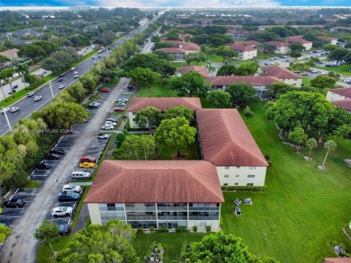 This inviting 2-bedroom, 1.5-bathroom condo on the 1st floor on Flamingo Lakes Country Club in Florida - for sale on GolfHomes.com, golf home, golf lot