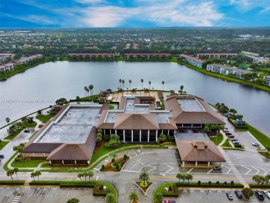 This inviting 2-bedroom, 1.5-bathroom condo on the 1st floor on Flamingo Lakes Country Club in Florida - for sale on GolfHomes.com, golf home, golf lot