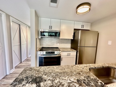 This newly renovated condo nestled between the 16th and 17th on Pinehurst Resort and Country Club in North Carolina - for sale on GolfHomes.com, golf home, golf lot