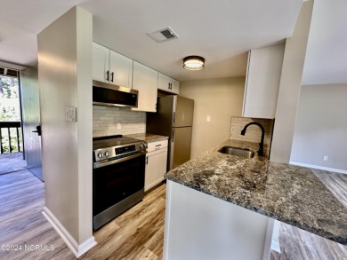 This newly renovated condo nestled between the 16th and 17th on Pinehurst Resort and Country Club in North Carolina - for sale on GolfHomes.com, golf home, golf lot