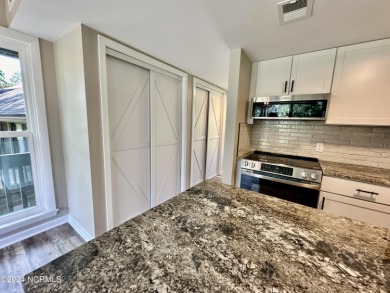 This newly renovated condo nestled between the 16th and 17th on Pinehurst Resort and Country Club in North Carolina - for sale on GolfHomes.com, golf home, golf lot