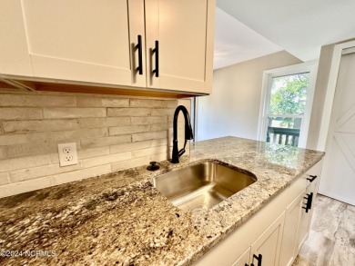 This newly renovated condo nestled between the 16th and 17th on Pinehurst Resort and Country Club in North Carolina - for sale on GolfHomes.com, golf home, golf lot