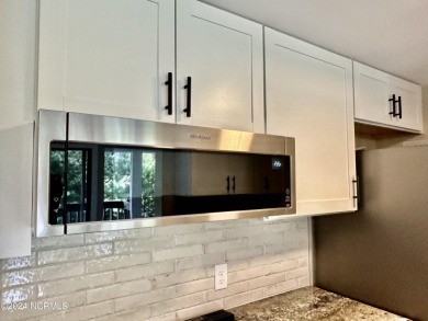 This newly renovated condo nestled between the 16th and 17th on Pinehurst Resort and Country Club in North Carolina - for sale on GolfHomes.com, golf home, golf lot