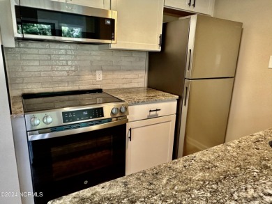 This newly renovated condo nestled between the 16th and 17th on Pinehurst Resort and Country Club in North Carolina - for sale on GolfHomes.com, golf home, golf lot