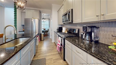 This move-in-ready home has it all! Floorplan with intentional on Gates Four Golf and Country Club in North Carolina - for sale on GolfHomes.com, golf home, golf lot