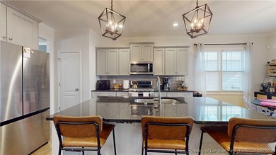 This move-in-ready home has it all! Floorplan with intentional on Gates Four Golf and Country Club in North Carolina - for sale on GolfHomes.com, golf home, golf lot