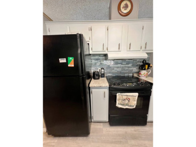 Charming, Fully Furnished Home - Move-In Ready! Step into on Lake Henry Golf Club in Florida - for sale on GolfHomes.com, golf home, golf lot