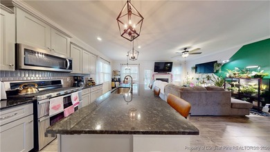 This move-in-ready home has it all! Floorplan with intentional on Gates Four Golf and Country Club in North Carolina - for sale on GolfHomes.com, golf home, golf lot