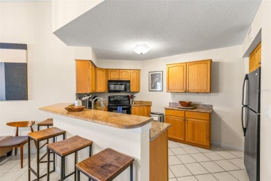 Highly Desirable Vista Verde North Condo Overlooking the 7th on Isla Del Sol Yacht and Country Club in Florida - for sale on GolfHomes.com, golf home, golf lot