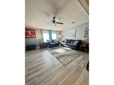 Charming, Fully Furnished Home - Move-In Ready! Step into on Lake Henry Golf Club in Florida - for sale on GolfHomes.com, golf home, golf lot