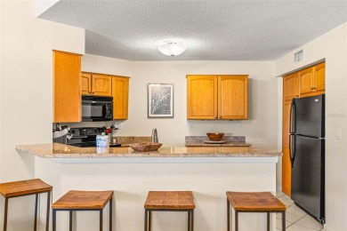 Highly Desirable Vista Verde North Condo Overlooking the 7th on Isla Del Sol Yacht and Country Club in Florida - for sale on GolfHomes.com, golf home, golf lot