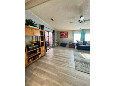 Charming, Fully Furnished Home - Move-In Ready! Step into on Lake Henry Golf Club in Florida - for sale on GolfHomes.com, golf home, golf lot