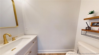 This move-in-ready home has it all! Floorplan with intentional on Gates Four Golf and Country Club in North Carolina - for sale on GolfHomes.com, golf home, golf lot