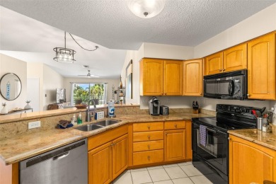 Highly Desirable Vista Verde North Condo Overlooking the 7th on Isla Del Sol Yacht and Country Club in Florida - for sale on GolfHomes.com, golf home, golf lot