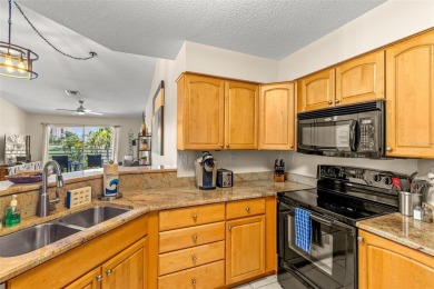 Highly Desirable Vista Verde North Condo Overlooking the 7th on Isla Del Sol Yacht and Country Club in Florida - for sale on GolfHomes.com, golf home, golf lot